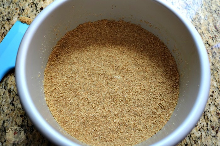 Pack crumbs into bottom of pan