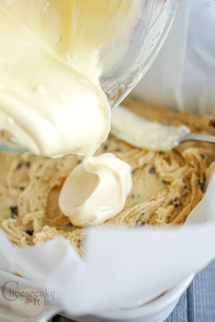 Pour cheesecake mixture over cookie mix