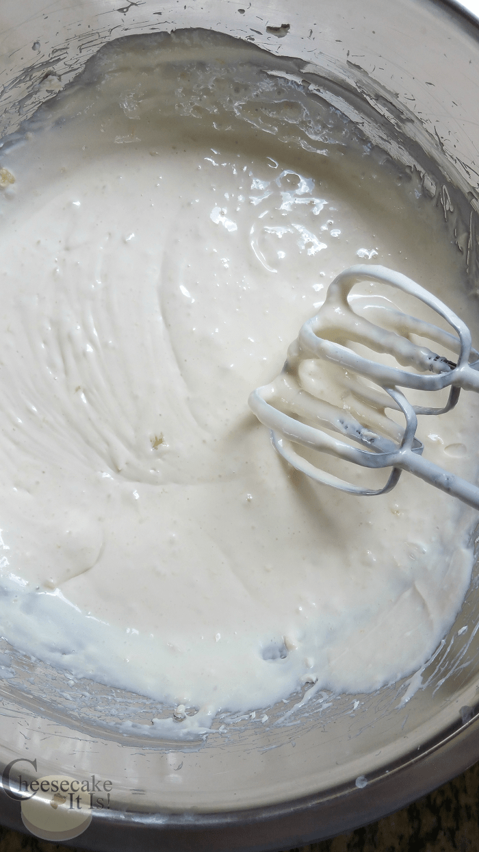 Mix cream cheese and cream in bowl