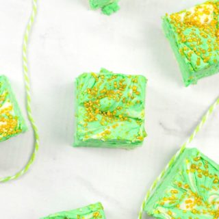Chunks of mint chocolate cheesecake fudge with gold sprinkles