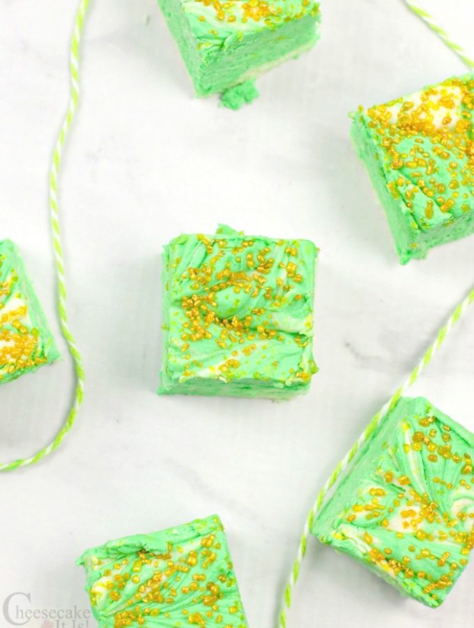 Chunks of mint chocolate cheesecake fudge with gold sprinkles