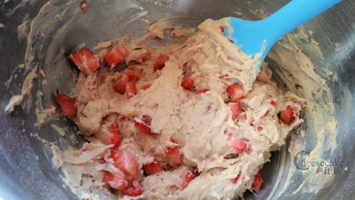 fold in strawberries to bread mixture
