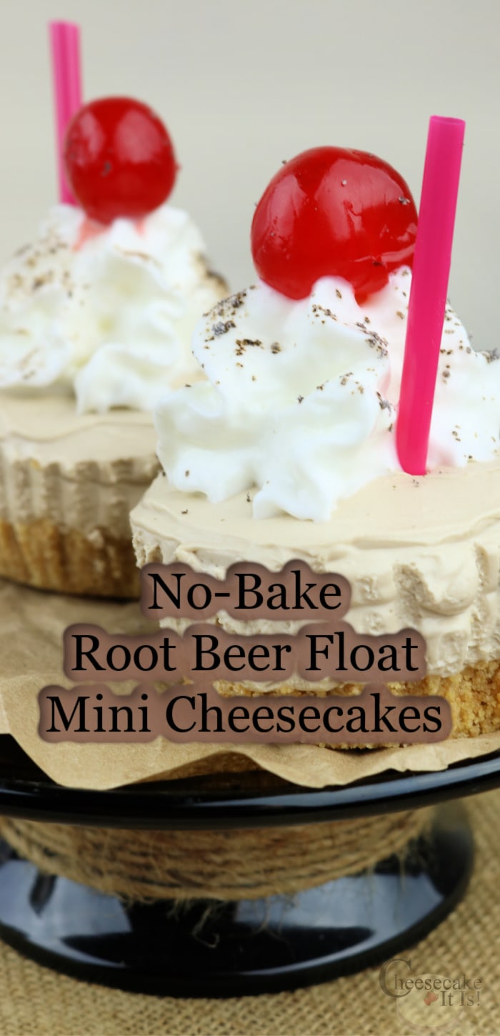 Two root beer flat mini cheesecakes with cherry on top on a black stand text overlay in middle