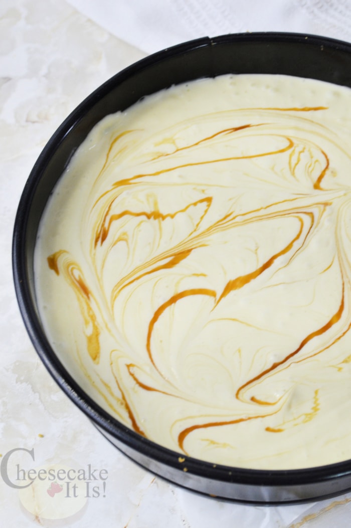 Swirl caramel into cheesecake batter