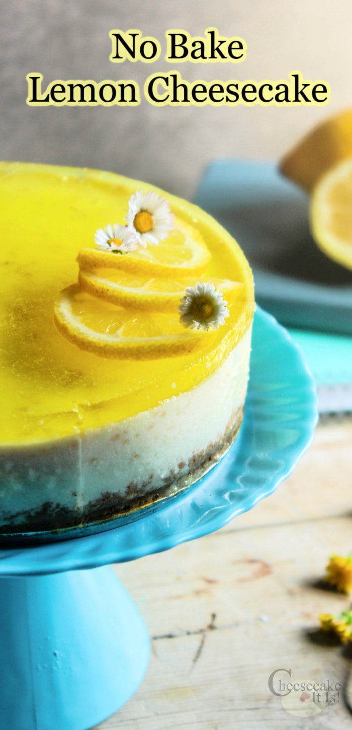 No bake lemon cheesecake on blue stand with 2 lemons in background text overlay at top