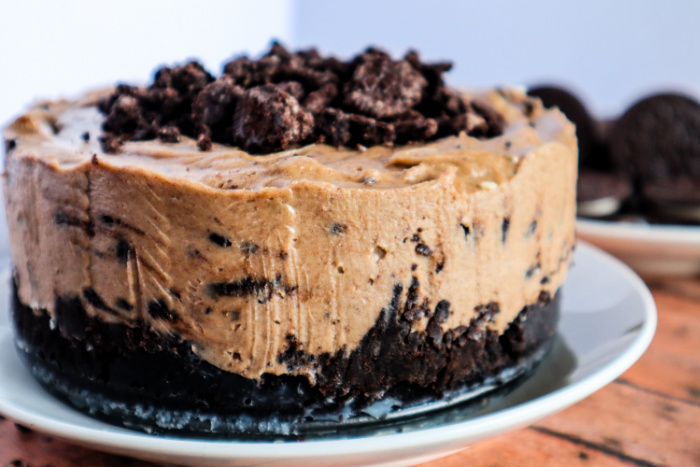 Side view of the whole oreo peanut butter cheesecake